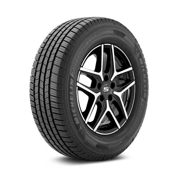 Full image of Michelin Defender LTX M/S Tire installed on wheel