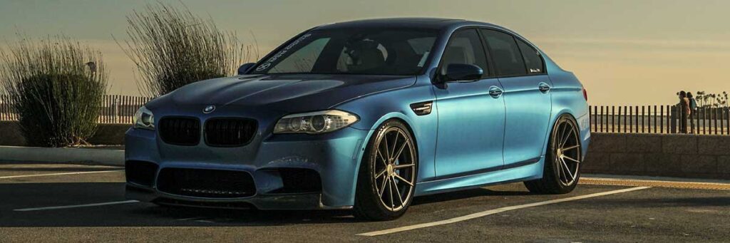 Showing a 2015 BMW M5 with TSW BATHURS wheels installation